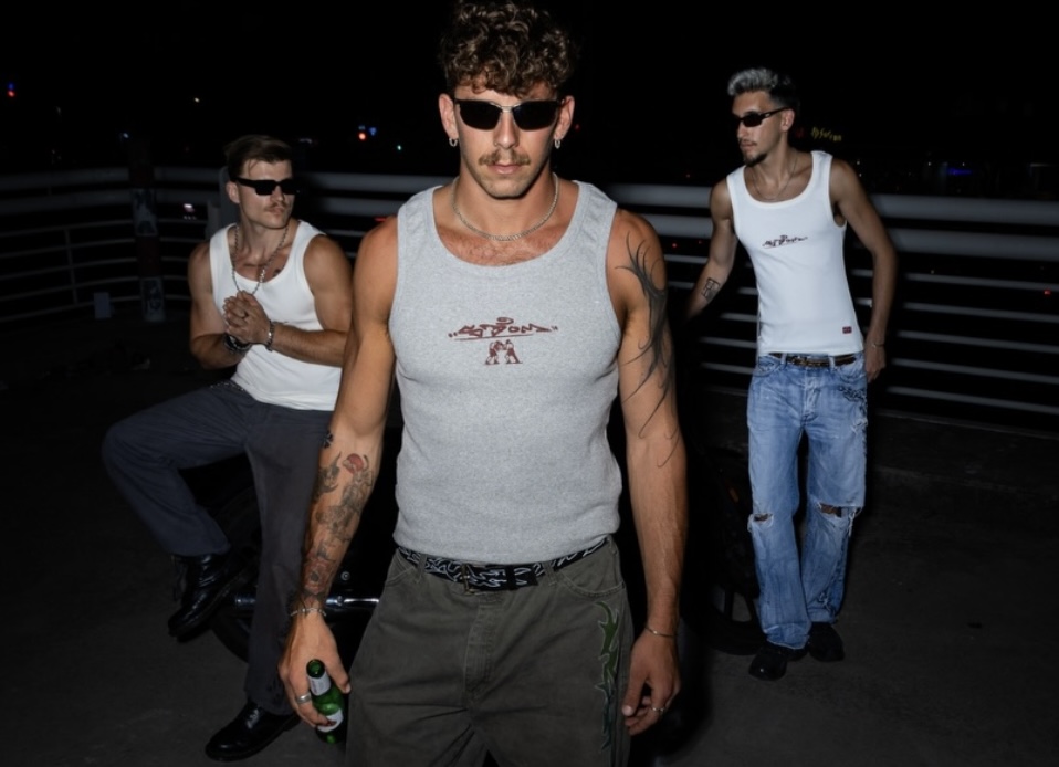 Night out — group in streetwear by the rail