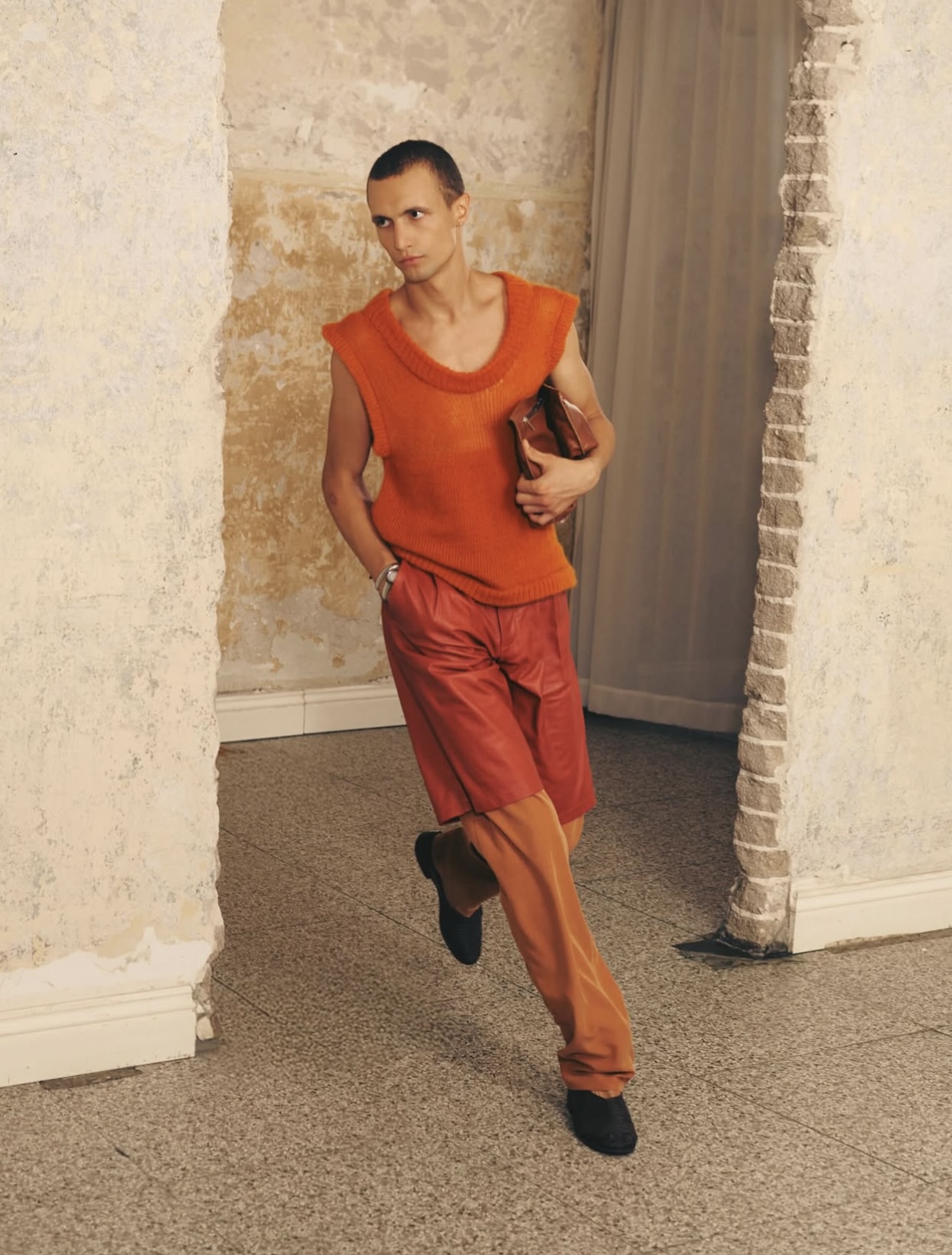 Gal Nell Dahan — orange knit and leather shorts