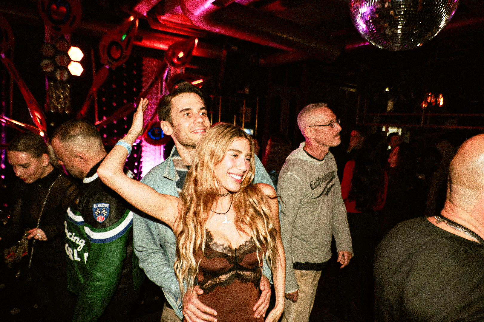 Zohar Levkovitz's birthday — couple dancing under a disco ball